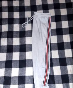 Light grey cuffed joggers with stripe on side
